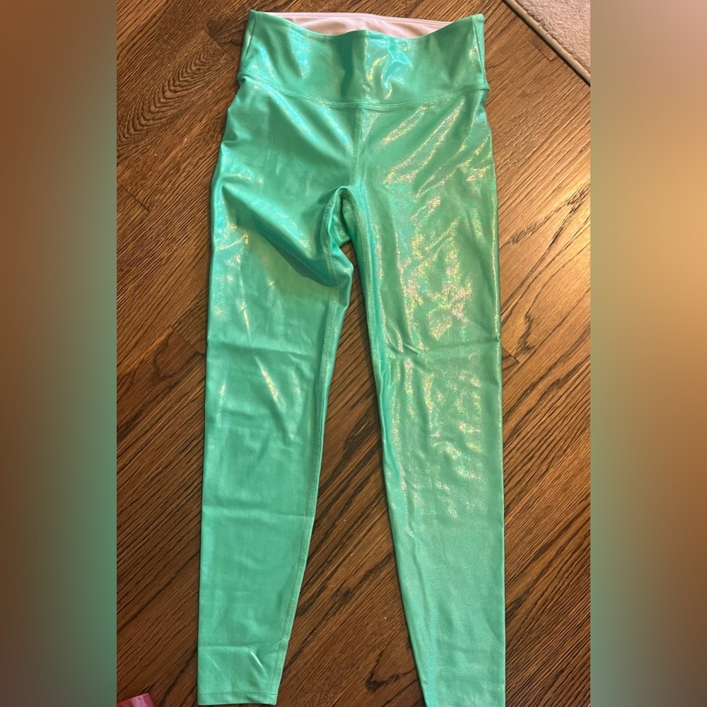Shiny Heroine Sport Leggings in “Slick Green”